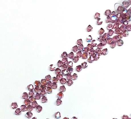 Preciosa 4mm Light Amethyst Glitter, Crystal Bicone - 30 pieces