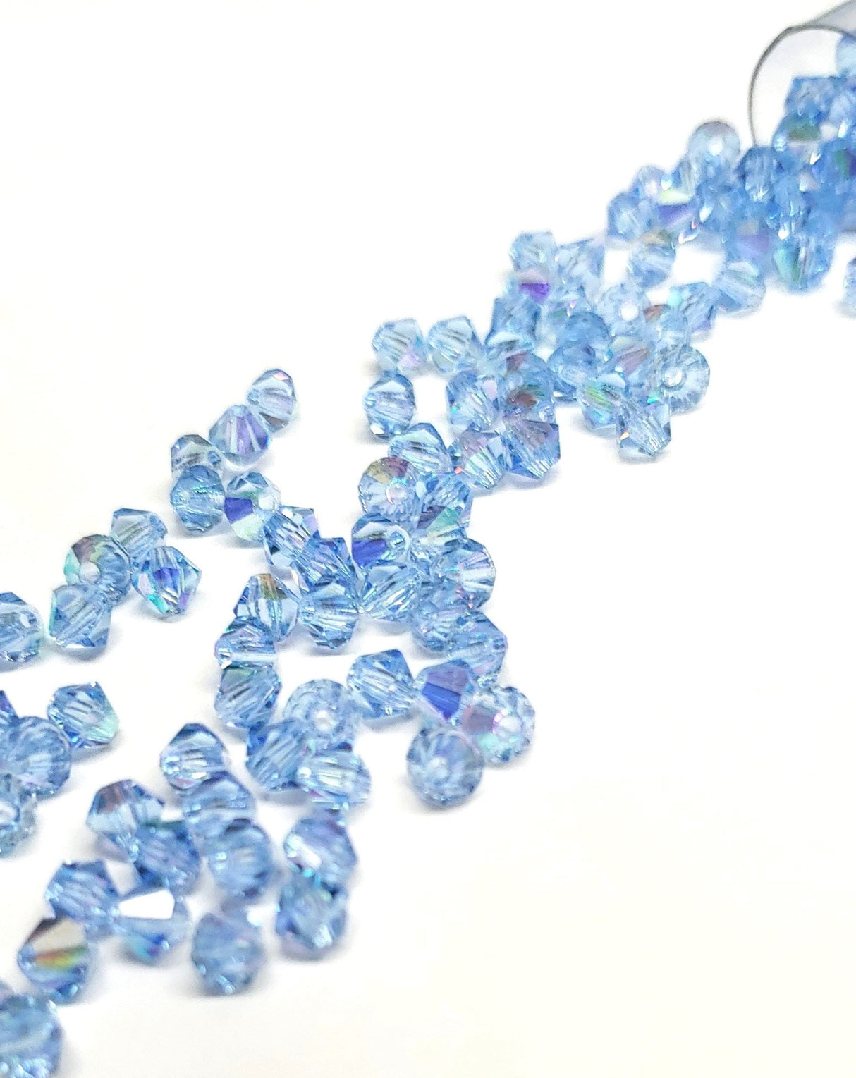 Preciosa 4mm Light Sapphire AB, Crystal Bicone, Czech Glass-30 Crystals