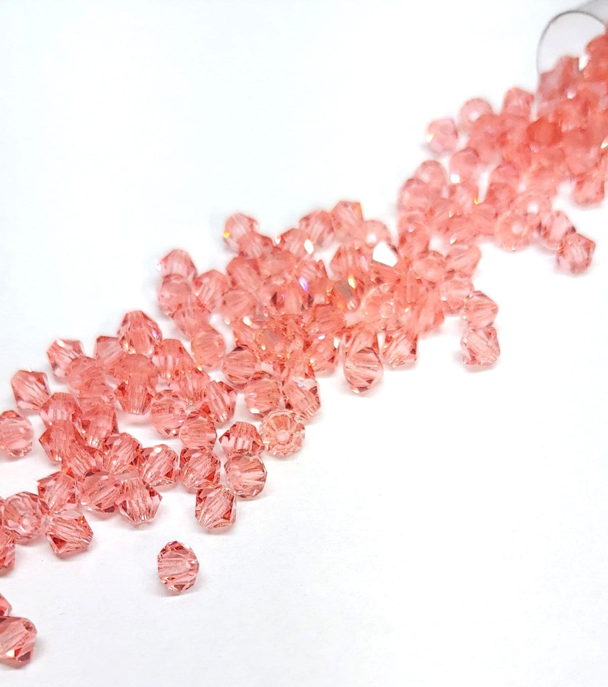 Preciosa 4mm Rose Peach, Crystal Bicone - 36 pieces